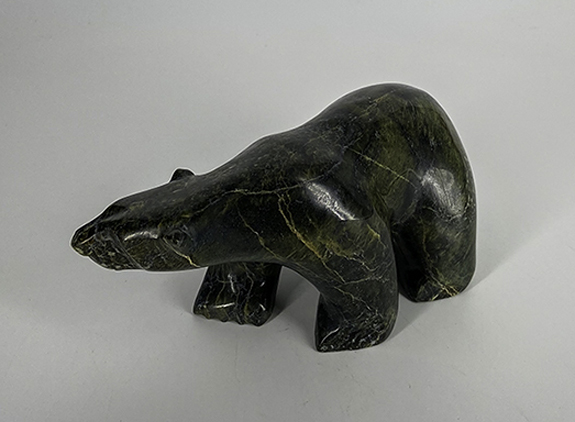 Walking Bear by Tony Oqutaq Inuit sculpture