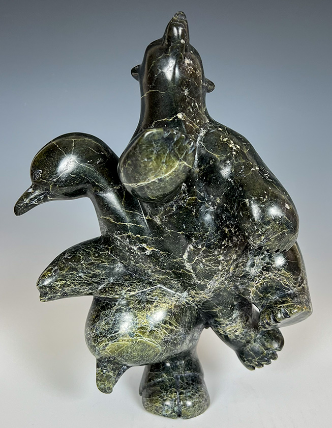 Animals inuit carving by Pudlalik shaa - inuit stone carving at Arctic Raven Gallery in Friday harbor WA