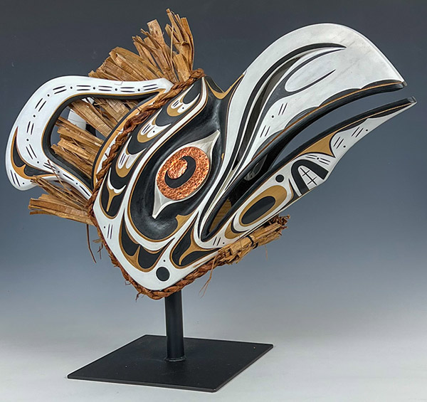 Raven Helmet, by Tom hunt, Northwest Coast art, wood sculpture on stand.
